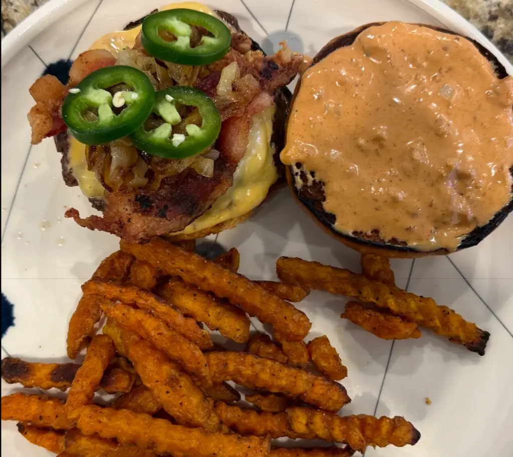 Bacon jalapeño smash burger with American cheese and Jeff’s chili crisp smash sauce
