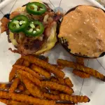 Bacon jalapeño smash burger with American cheese and Jeff’s chili crisp smash sauce